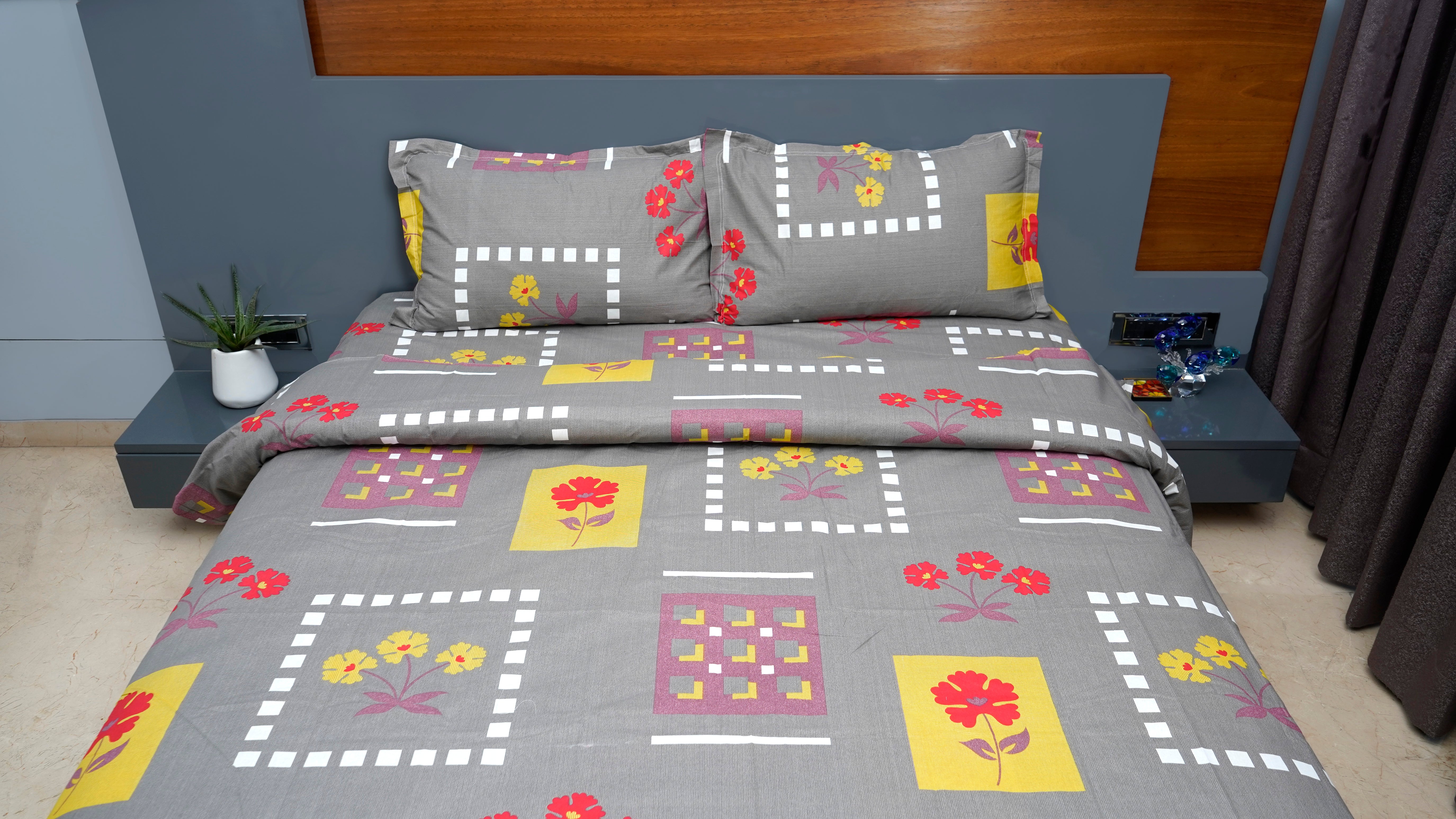 Dark grey with playful red and yellow flowers double bedsheet with pillow covers