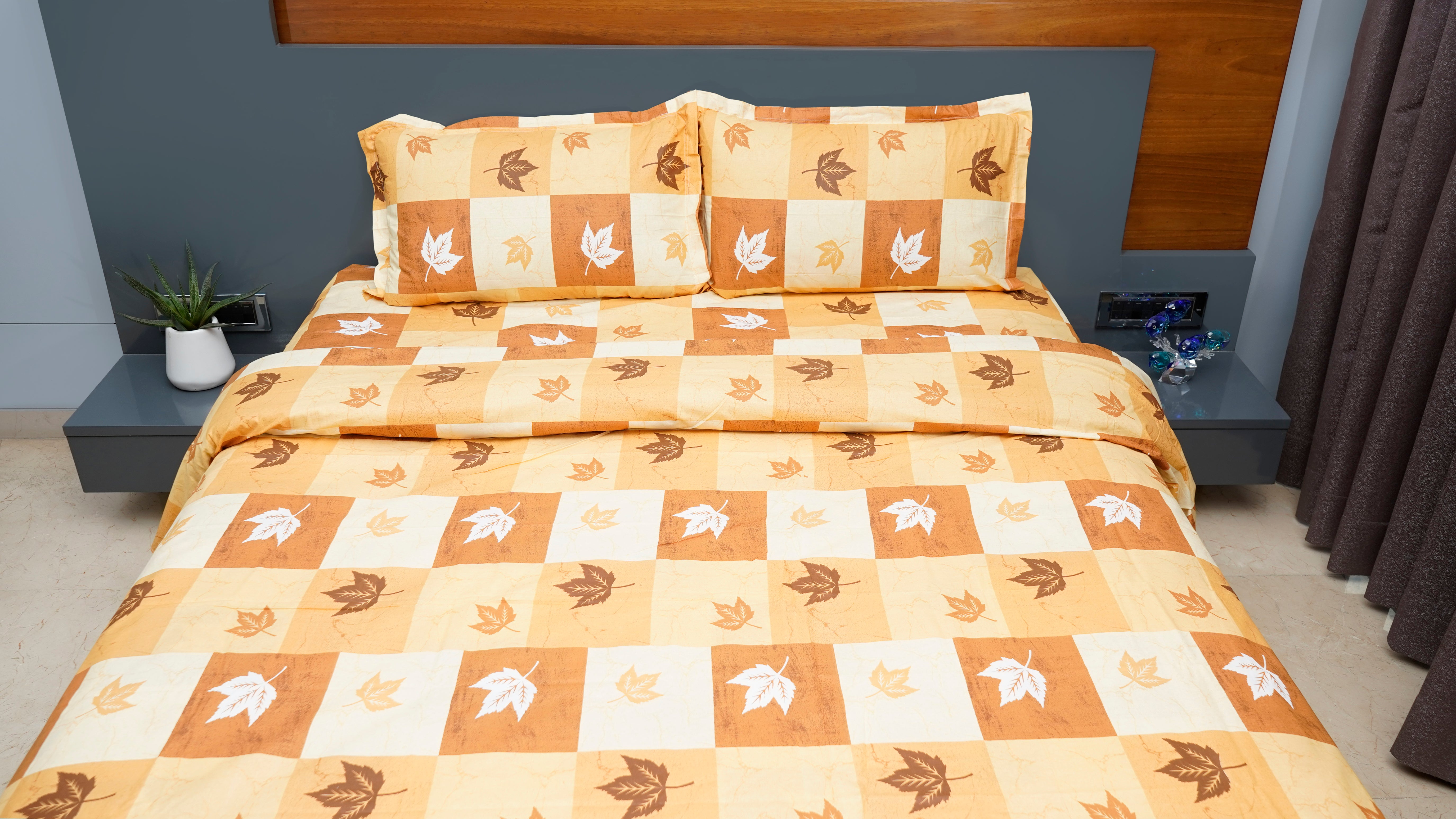 Brown shaded checks with maple prints double bedsheet with pillow covers