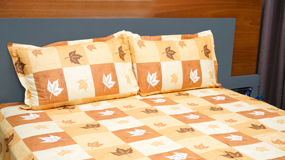 Brown shaded checks with maple prints double bedsheet with pillow covers