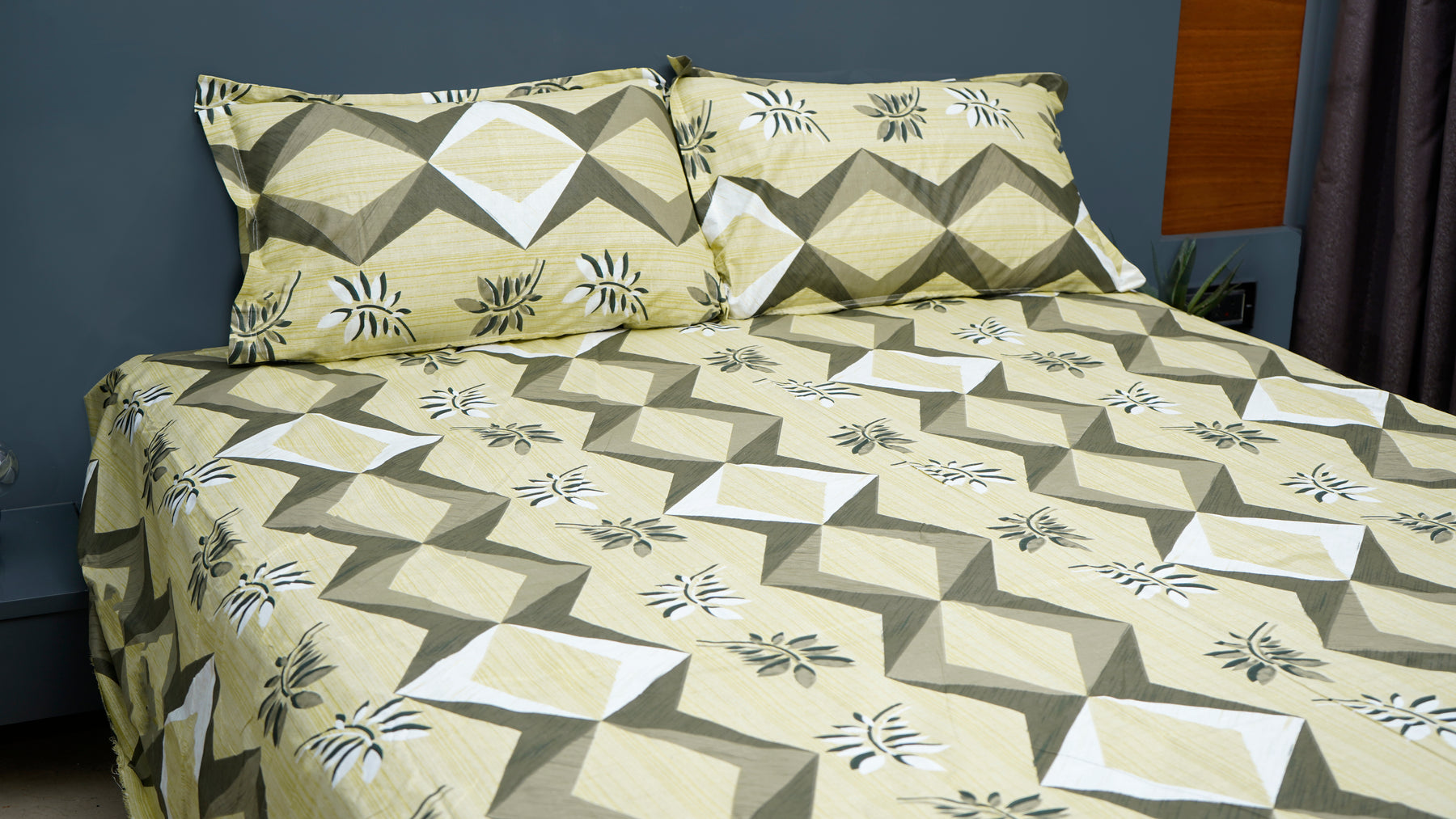 Pista green geometric and leaf prints double bedsheet with pillow covers