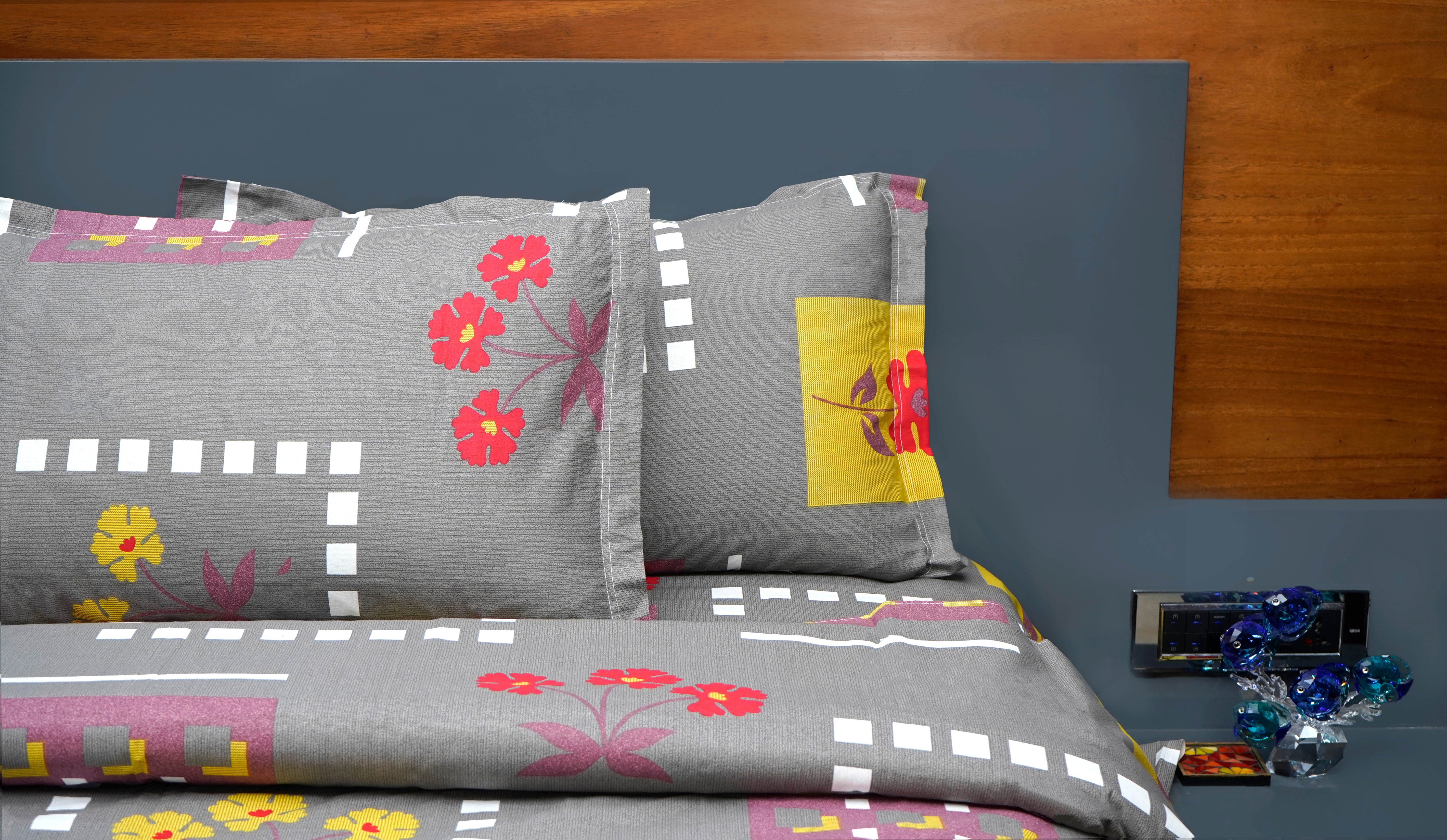 Dark grey with playful red and yellow flowers double bedsheet with pillow covers