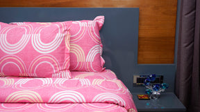 Pink with Rainbow shape prints double bedsheet with pillow covers