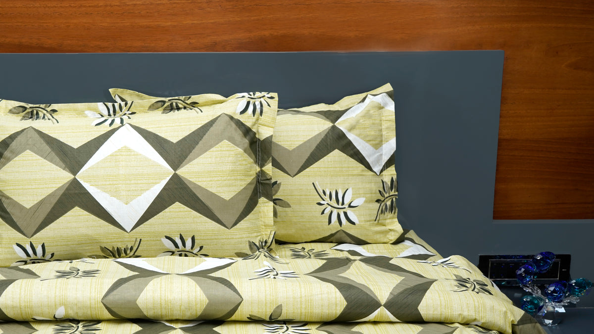 Pista green geometric and leaf prints double bedsheet with pillow covers