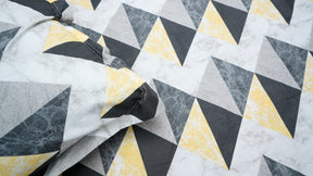 Black and yellow shaded triangular print double bedsheet with pillow cover