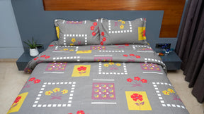 Dark grey with playful red and yellow flowers double bedsheet with pillow covers
