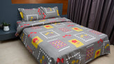 Dark grey with playful red and yellow flowers double bedsheet with pillow covers